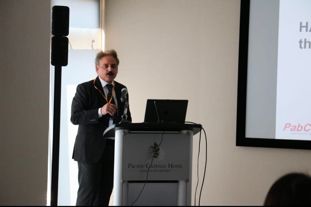 Dr. Vikram Pabreja presenting at an international conference in Vancouver, Canada